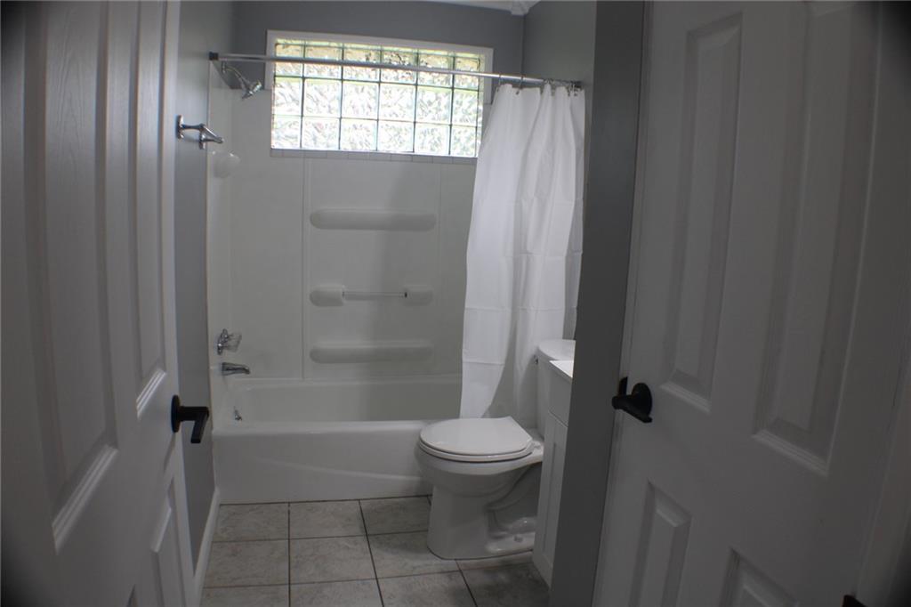 312 Cherokee Drive Butler, PA 16001 - Photo 17 of 40 a bathroom with a shower and a toilet
