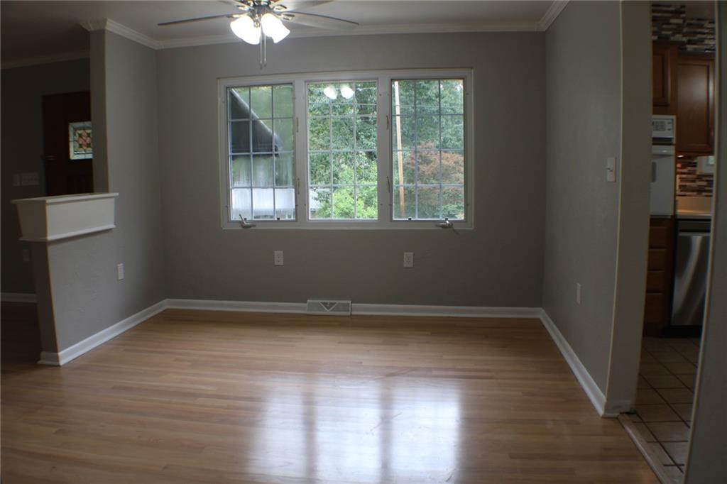 312 Cherokee Drive Butler, PA 16001 - Photo 20 of 40 wooden floor in an empty room with a window