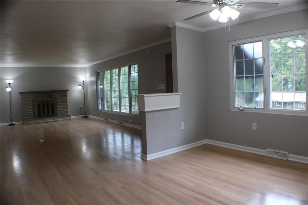312 Cherokee Drive Butler, PA 16001 - Photo 21 of 40 an empty room with wooden floor and windows