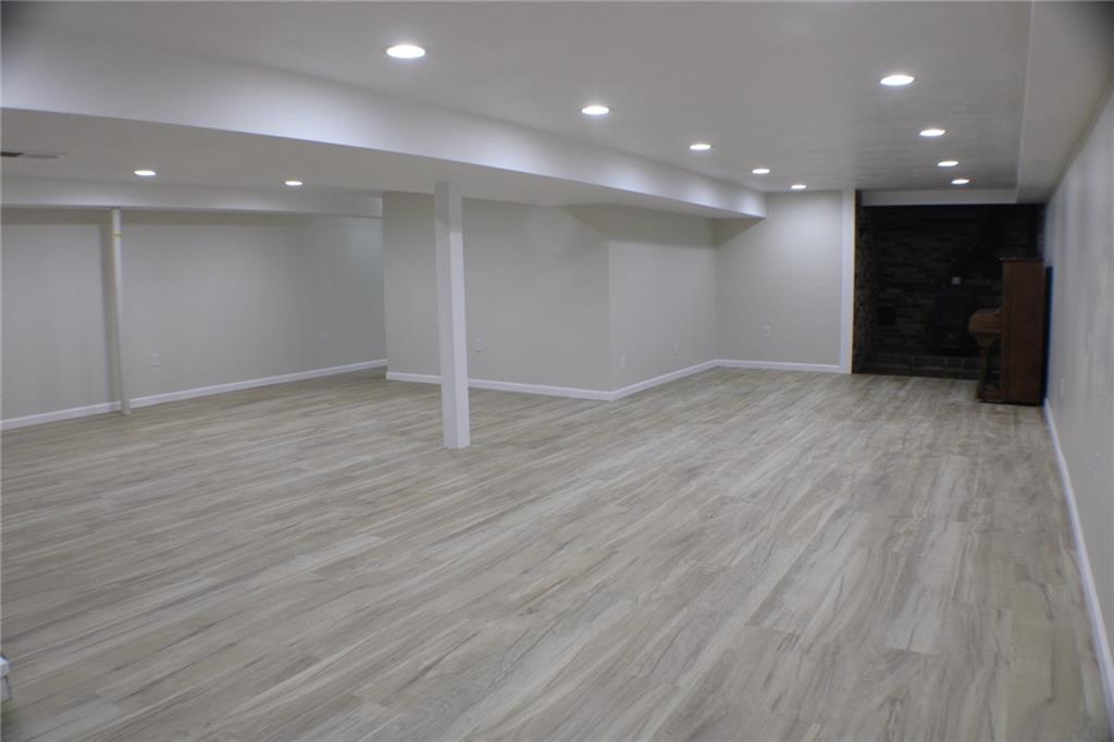 312 Cherokee Drive Butler, PA 16001 - Photo 25 of 40 a view of an empty room with wooden floor