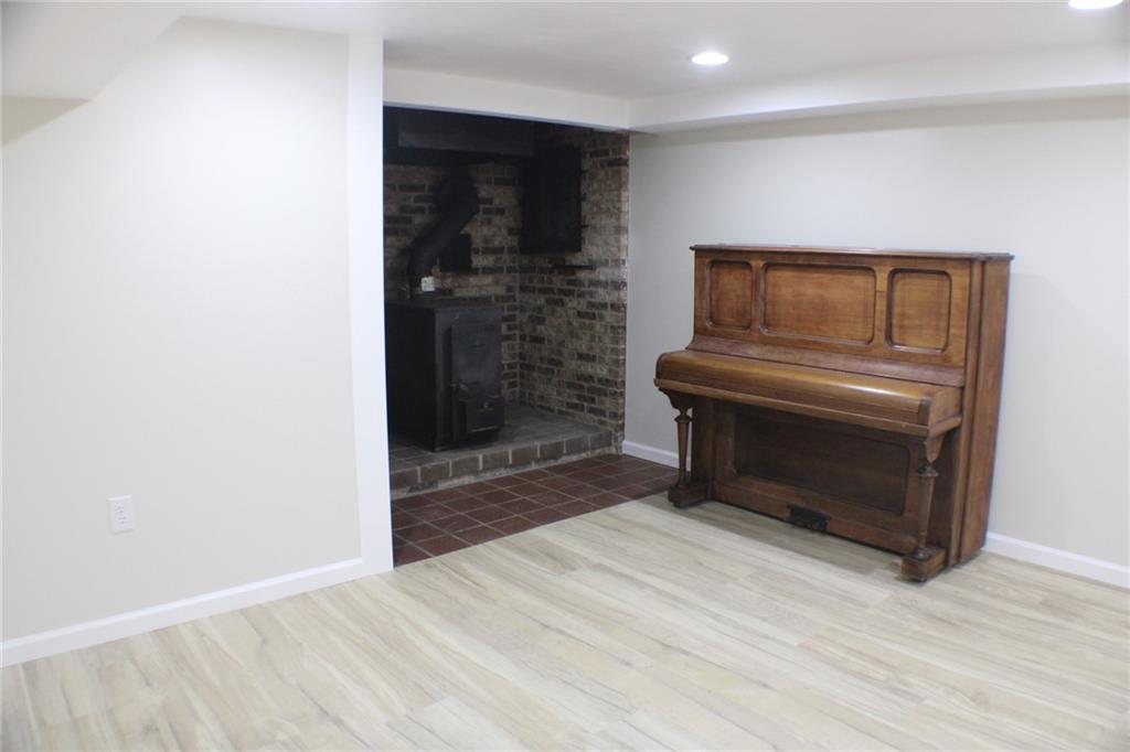 312 Cherokee Drive Butler, PA 16001 - Photo 27 of 40 a room with a fireplace