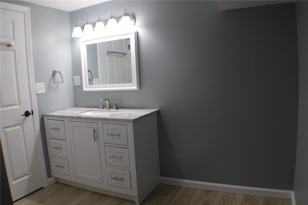 312 Cherokee Drive Butler, PA 16001 - Photo 29 of 40 a bathroom with a sink vanity and mirror