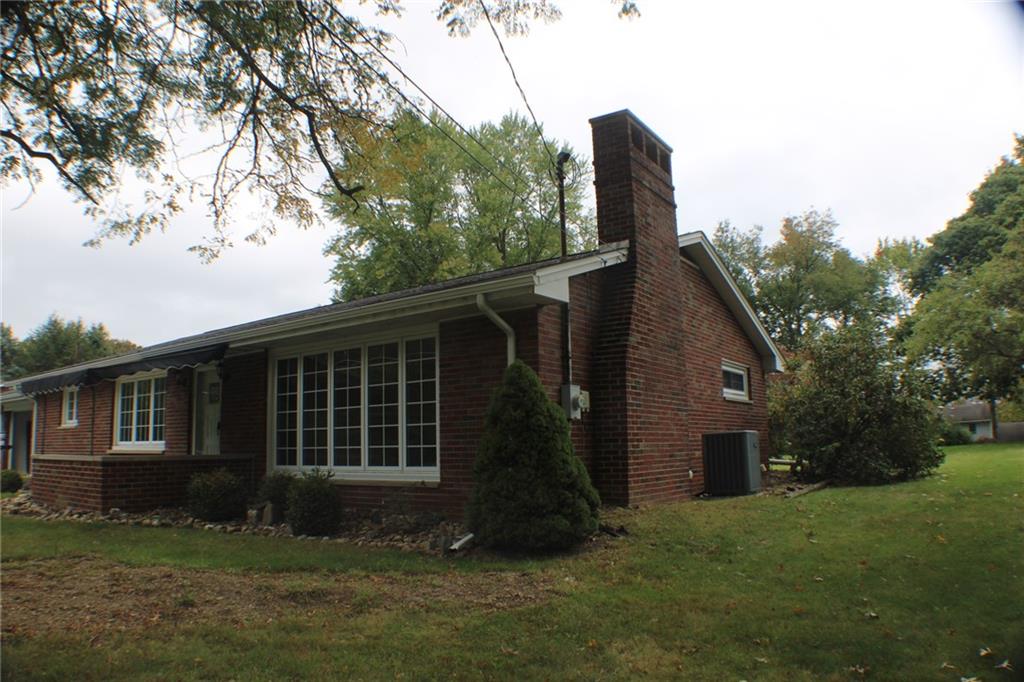 312 Cherokee Drive Butler, PA 16001 - Photo 36 of 40 a front view of a house with a garden