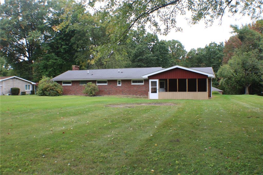 312 Cherokee Drive Butler, PA 16001 - Photo 39 of 40 a front view of a house with garden