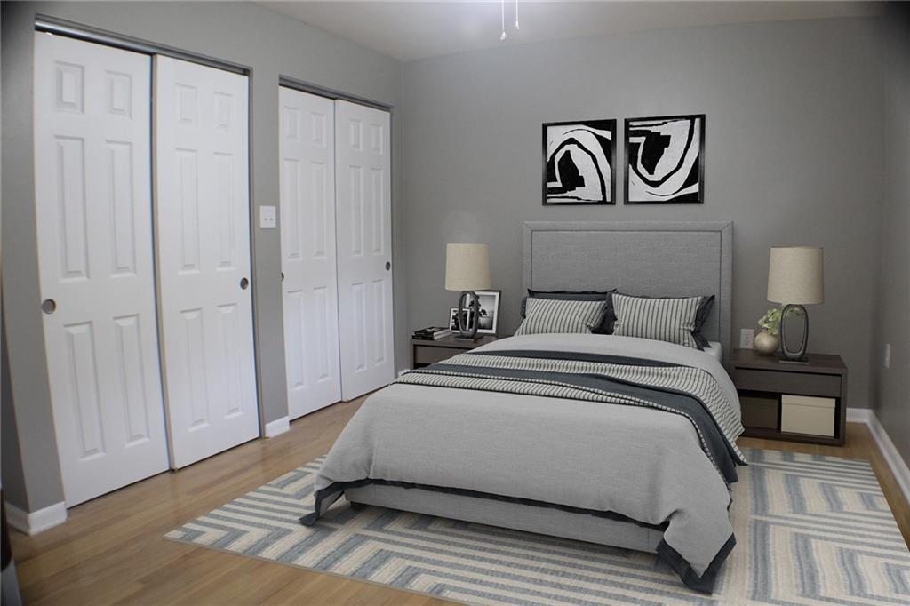 312 Cherokee Drive Butler, PA 16001 - Photo 5 of 40 a bedroom with a bed and a lamp on table