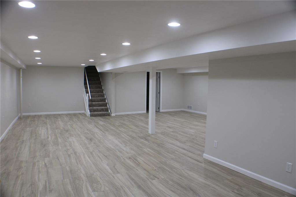 312 Cherokee Drive Butler, PA 16001 - Photo 7 of 40 an empty room with wooden floor and windows