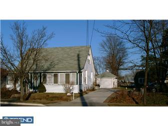 505 South Warwick Road Magnolia, NJ 08049 - Photo 1 of 9 a black and white photo of a house