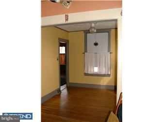 505 South Warwick Road Magnolia, NJ 08049 - Photo 3 of 9 a view of a hallway with wooden floor