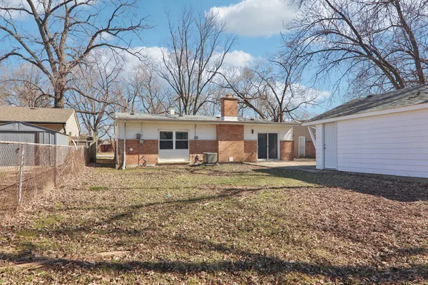 a house with trees in front of it