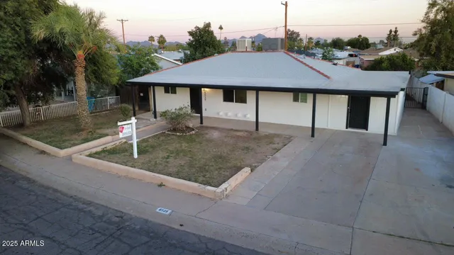 a aerial view of a house table and chairs