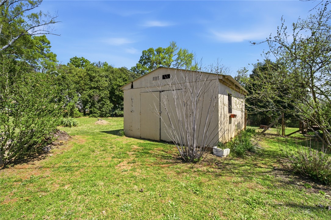 618 Aiken Street Calhoun Falls, SC 29628 - Photo 14 of 21 This spacious yard offers ample outdoor potential with a functional shed.