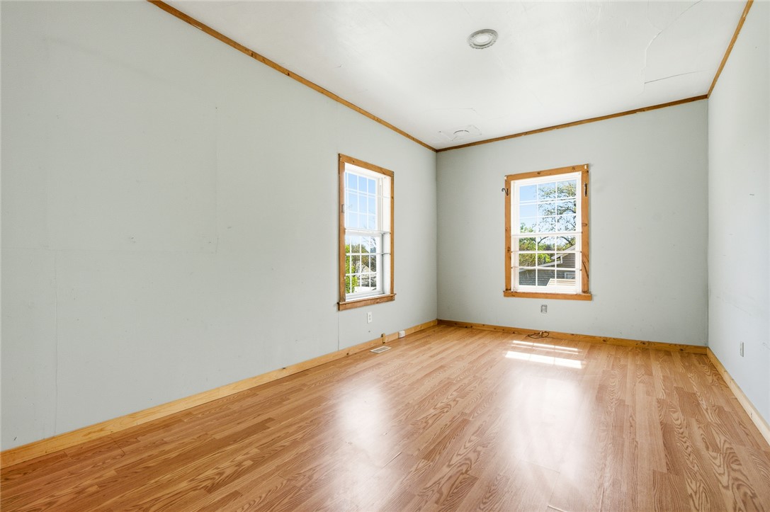 618 Aiken Street Calhoun Falls, SC 29628 - Photo 4 of 21 This spacious room features ample natural light and durable wood flooring.