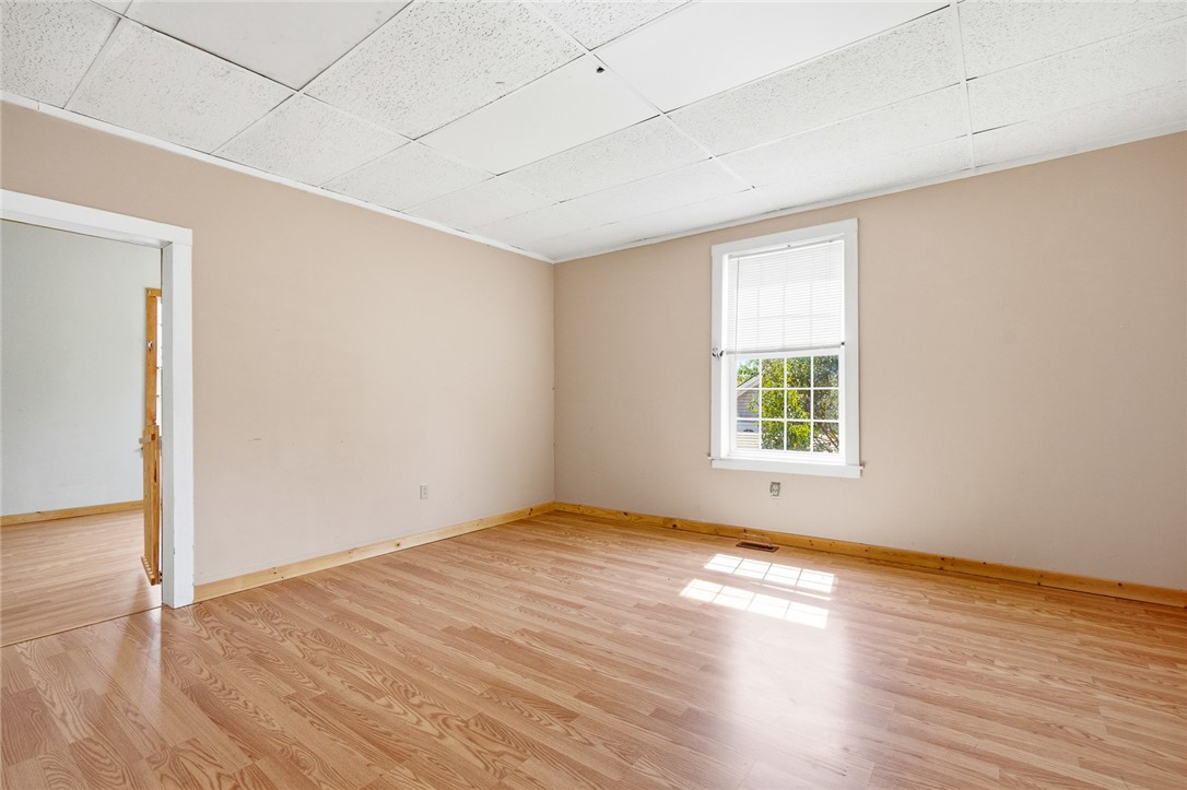 618 Aiken Street Calhoun Falls, SC 29628 - Photo 6 of 21 This bright room features a large window, offering ample natural light for a refreshing atmosphere.