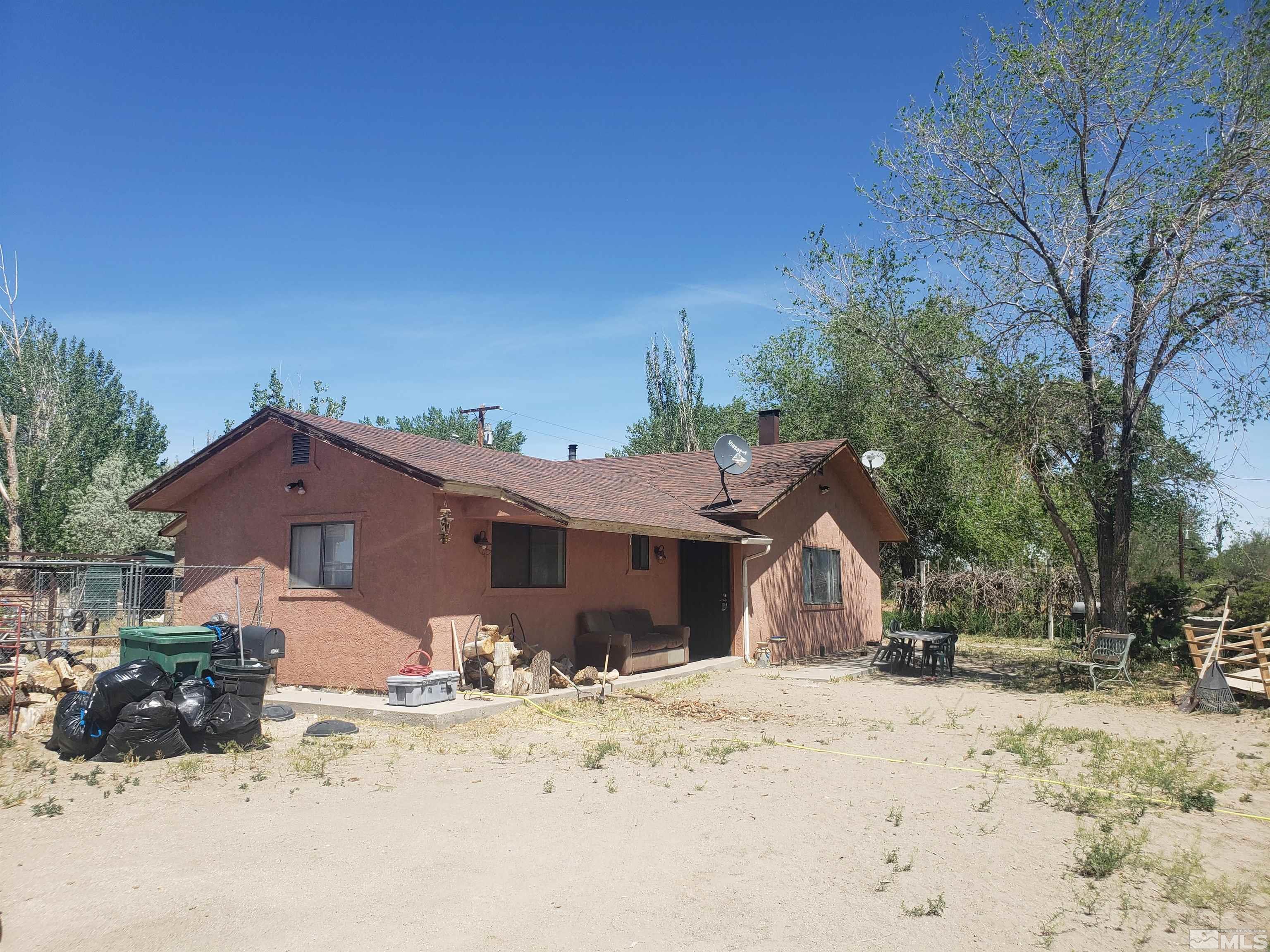 4044 Schurz Highway Fallon, NV 89406 - Photo 2 of 29 a view of a house with a yard