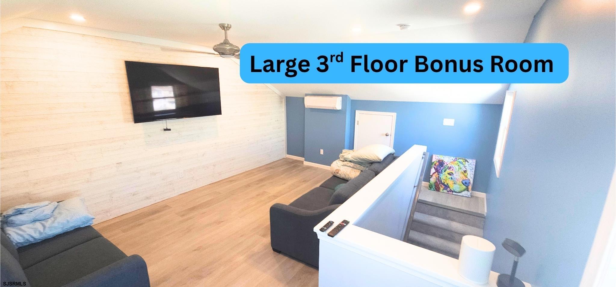 322 38th Street South, Unit B Brigantine, NJ 08203 - Photo 17 of 21 a view of living room with furniture and screen tv