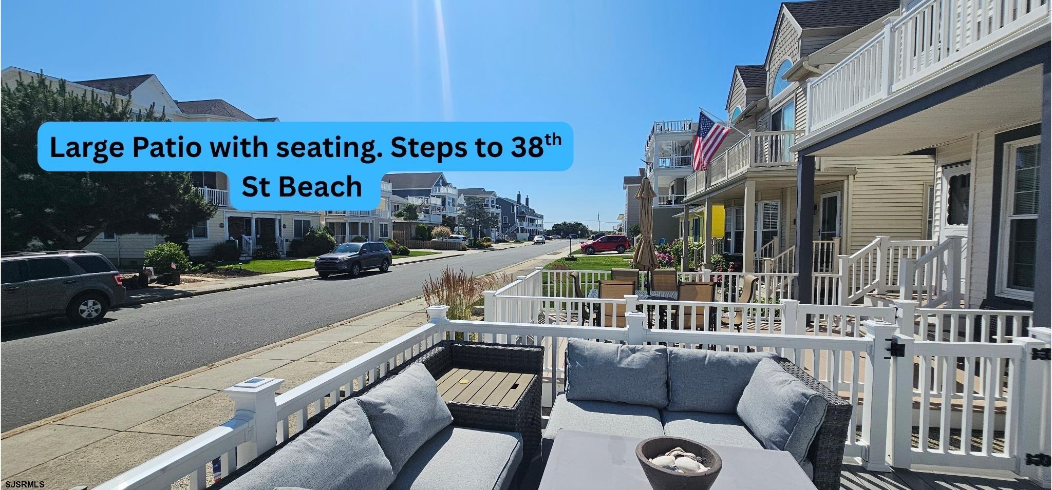 322 38th Street South, Unit B Brigantine, NJ 08203 - Photo 18 of 21 a view of a street with furniture and parked area