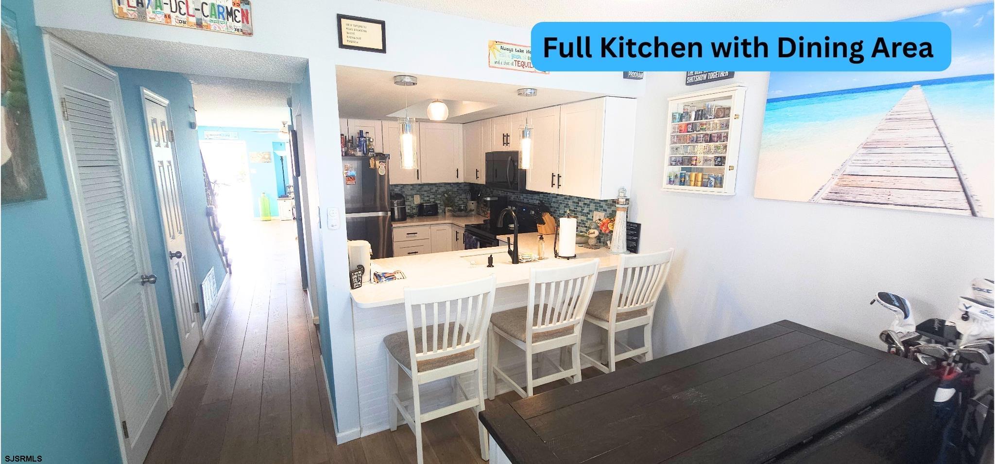 322 38th Street South, Unit B Brigantine, NJ 08203 - Photo 19 of 21 a view of a dining room with furniture