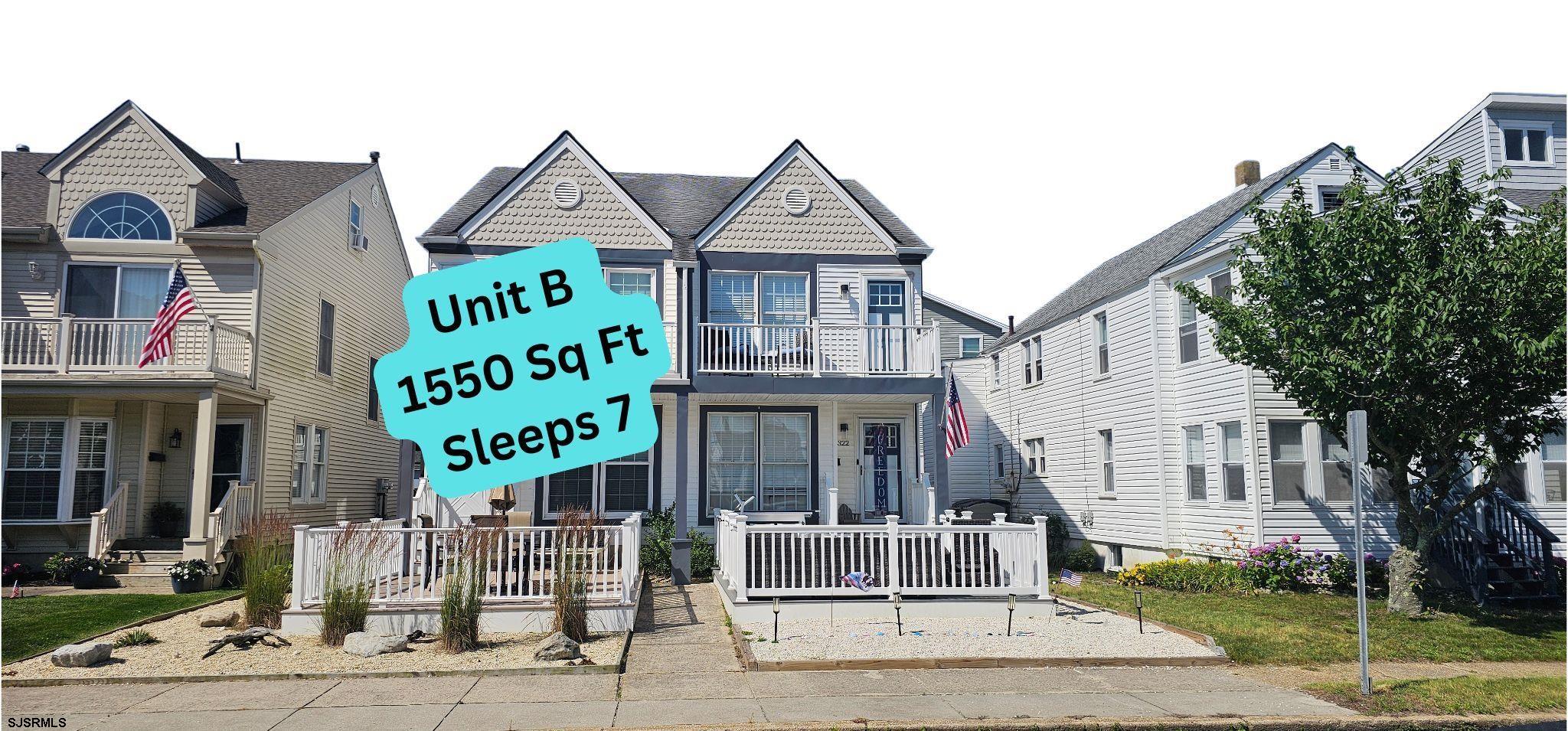 322 38th Street South, Unit B Brigantine, NJ 08203 - Photo 3 of 21 a front view of a residential apartment building with a garden and plants