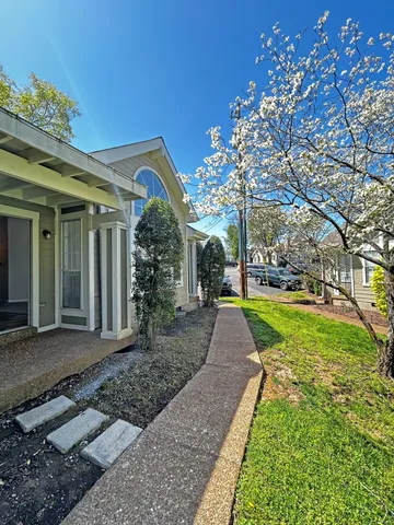 a view of a house with a swimming pool