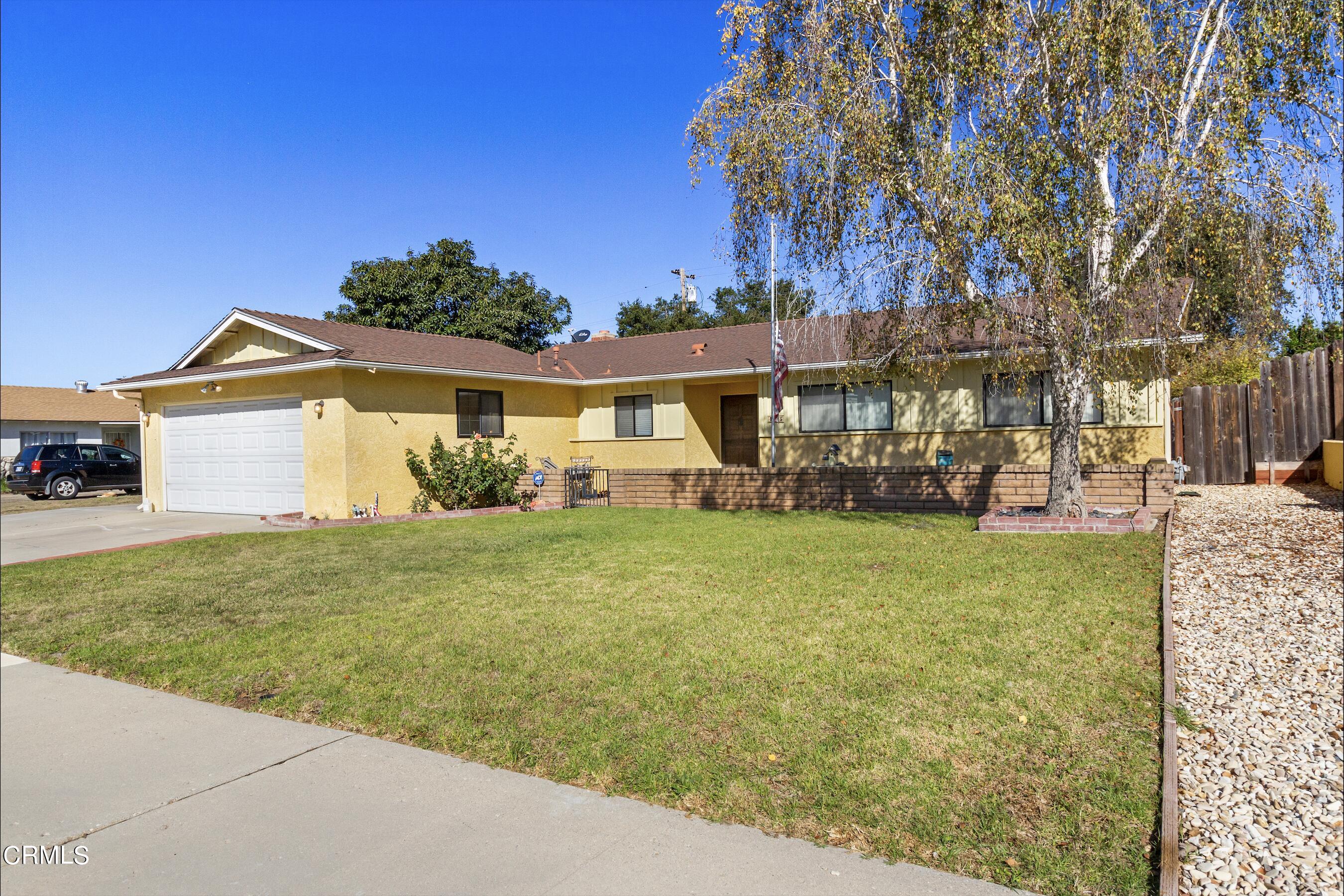 445 Rutgers Drive Santa Maria, CA 93455 - Photo 1 of 21 a front view of a house with garden