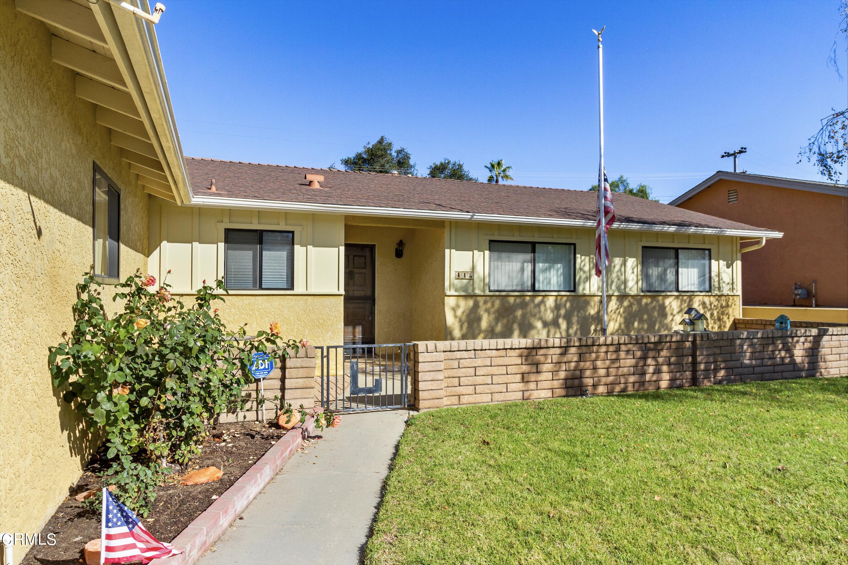 445 Rutgers Drive Santa Maria, CA 93455 - Photo 2 of 21 a front view of a house with garden