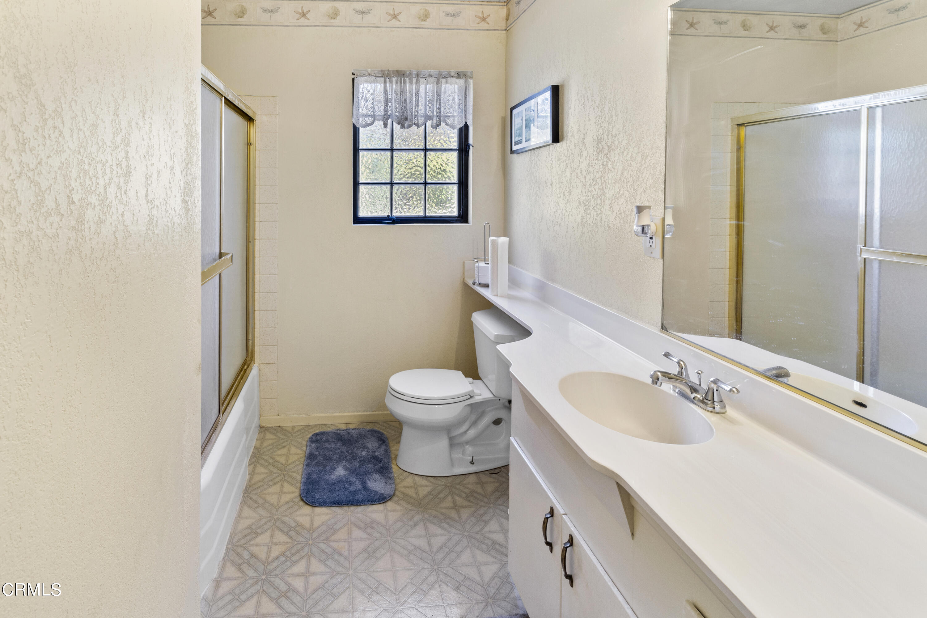 445 Rutgers Drive Santa Maria, CA 93455 - Photo 12 of 21 a bathroom with a sink a toilet and shower
