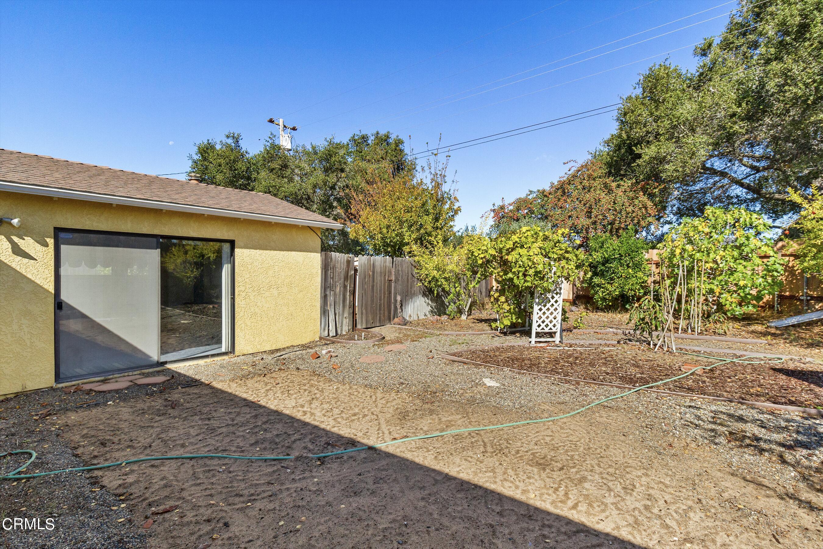 445 Rutgers Drive Santa Maria, CA 93455 - Photo 21 of 21 a view of a house with a yard and tree