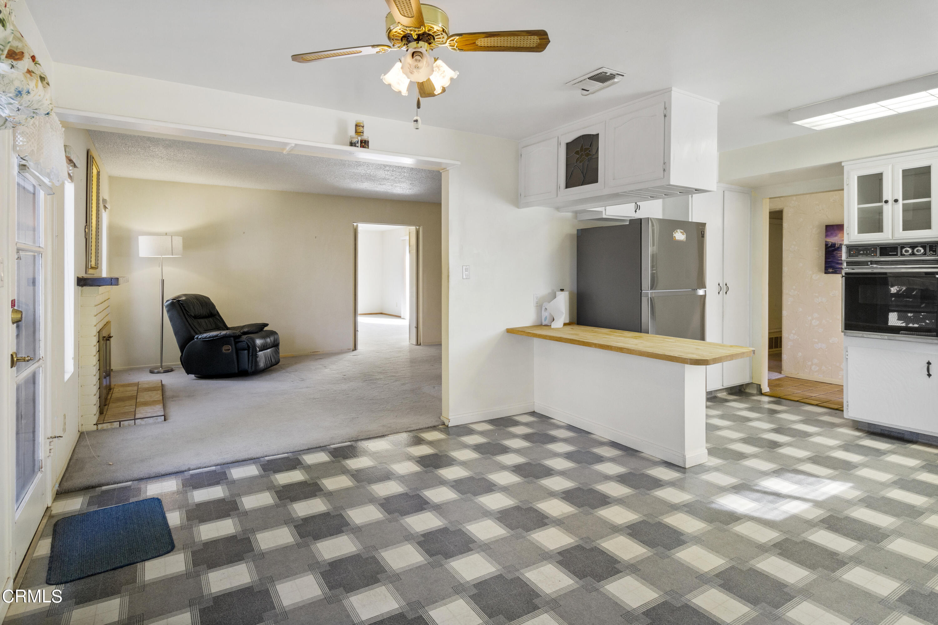 445 Rutgers Drive Santa Maria, CA 93455 - Photo 5 of 21 a very nice looking room with a large window and chandelier