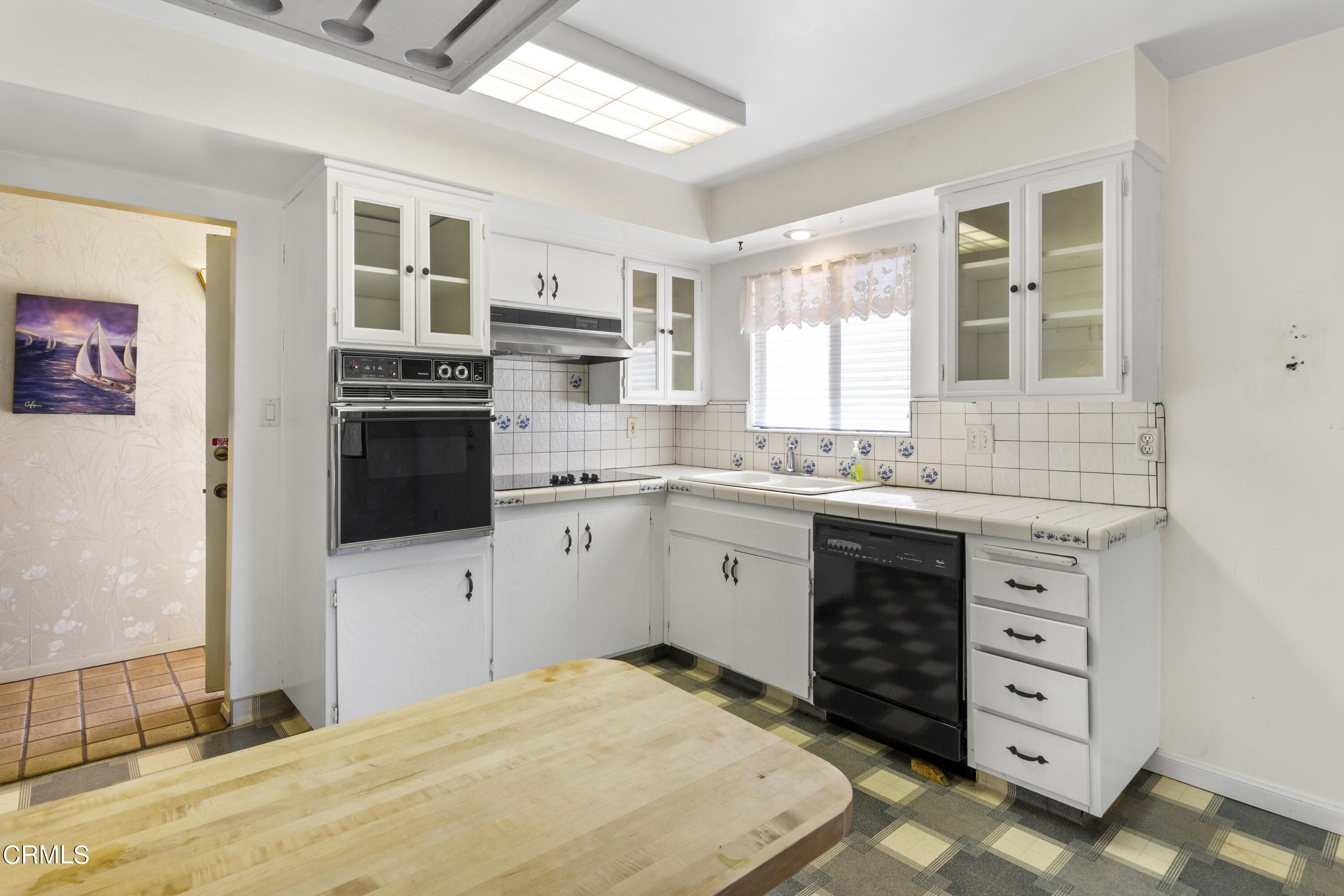 445 Rutgers Drive Santa Maria, CA 93455 - Photo 7 of 21 a kitchen with stainless steel appliances a stove a sink and a refrigerator