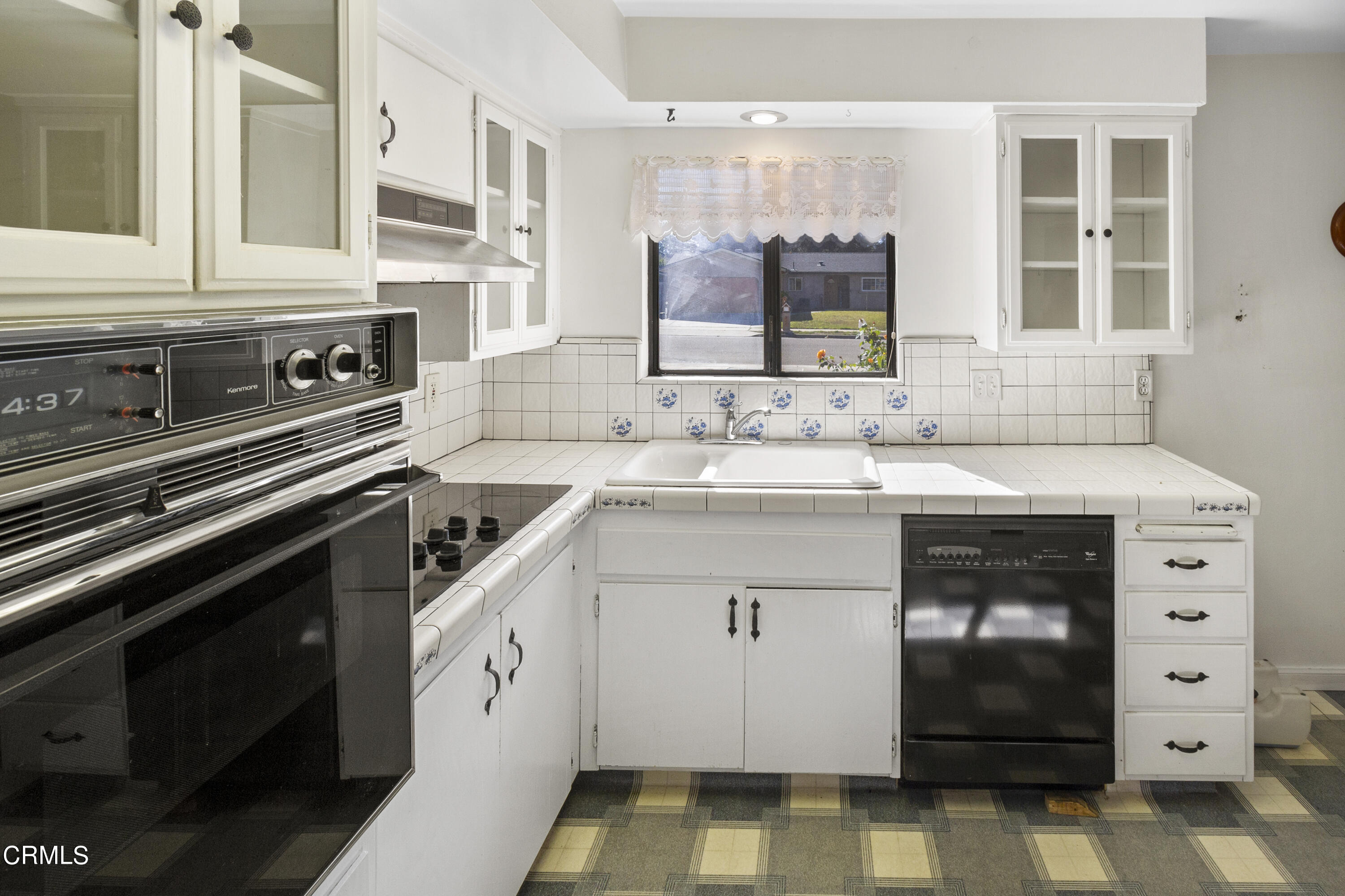 445 Rutgers Drive Santa Maria, CA 93455 - Photo 8 of 21 a kitchen with a stove oven and sink