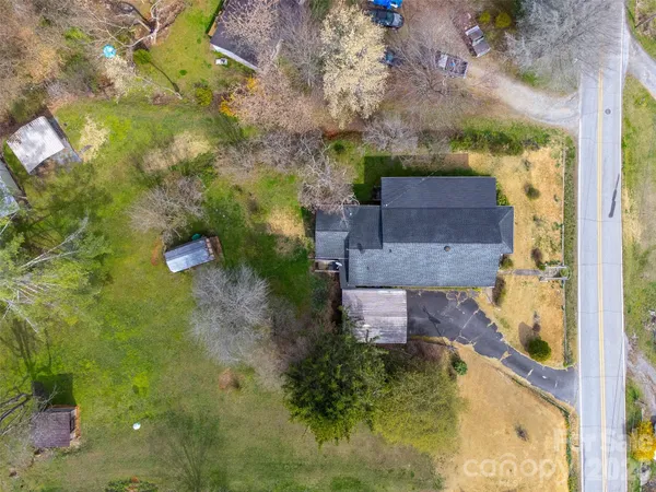 a view of a backyard with green space