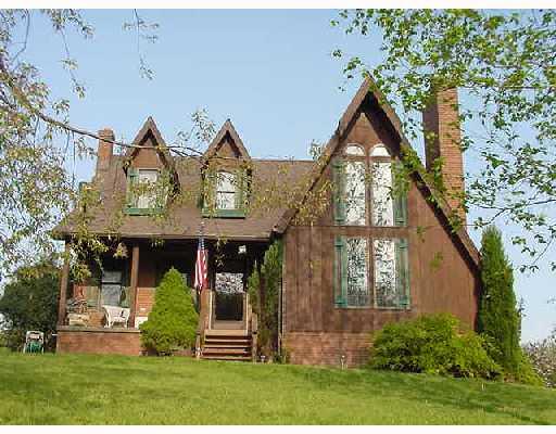 Exterior Front. Gorgeous Country Chalet on over 12 Acres of land!  Enjoy and live the dream!