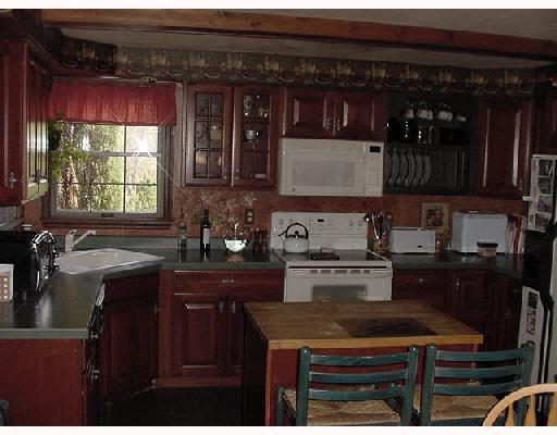 20 Reese Road Washington, PA 15301 - Photo 2 of 8 Kitchen. Nice! With lovely cherry cabinetry. Center island for eating and extra prep space. Corner sink w/window w/a view!