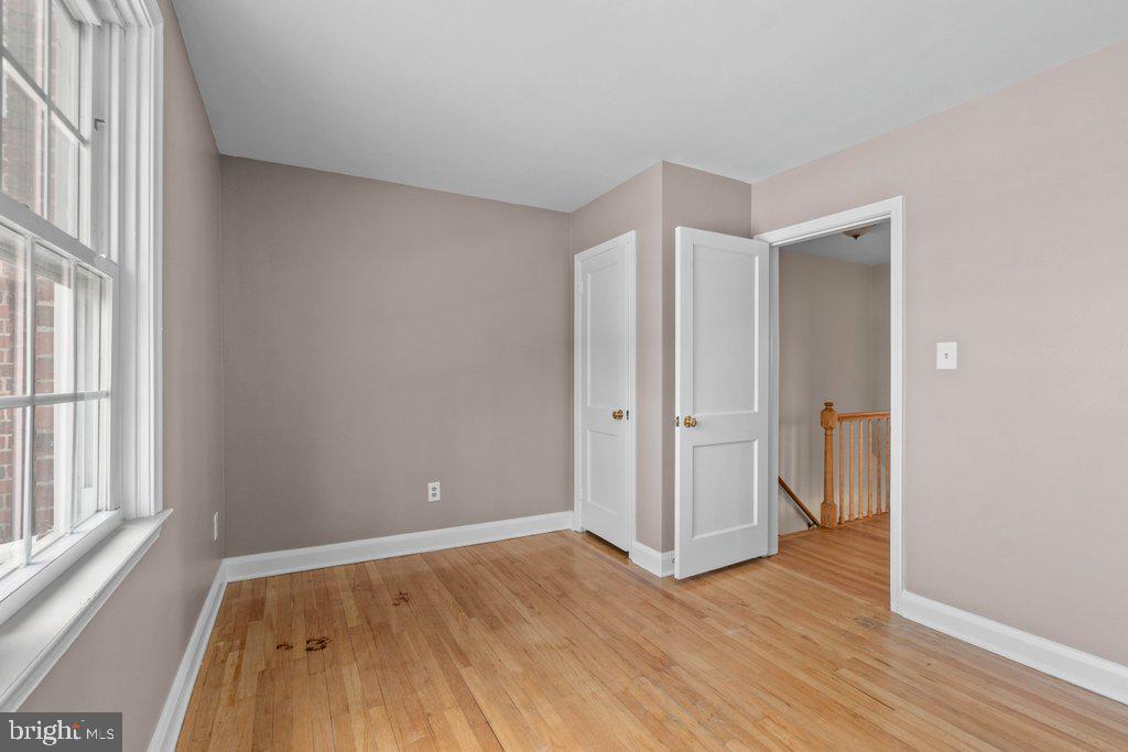 1522 Doxbury Road Baltimore, MD 21286 - Photo 17 of 28 a view of room with window and wooden floor