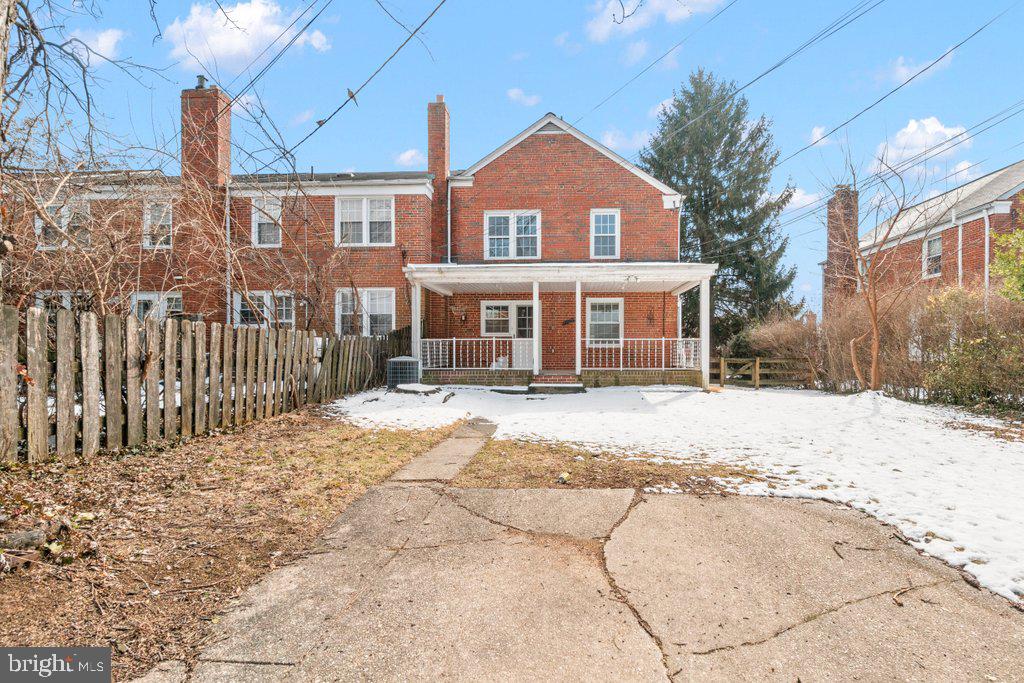 1522 Doxbury Road Baltimore, MD 21286 - Photo 25 of 28 a front view of a house with a yard