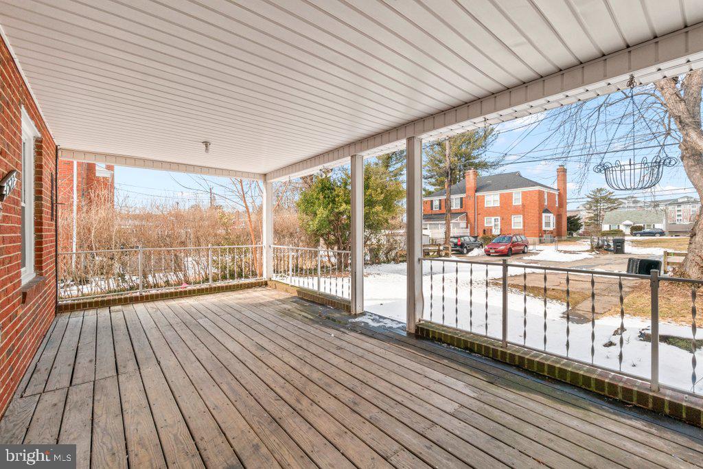 1522 Doxbury Road Baltimore, MD 21286 - Photo 26 of 28 a view of a balcony with wooden floor