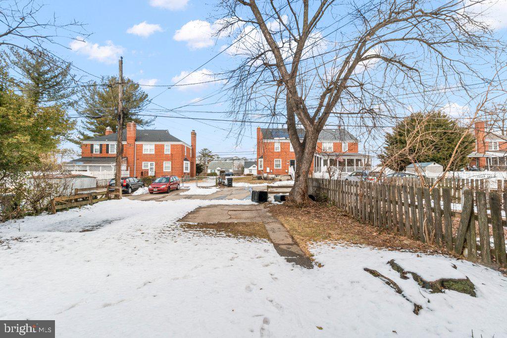 1522 Doxbury Road Baltimore, MD 21286 - Photo 27 of 28 a view of street with a snow on the road