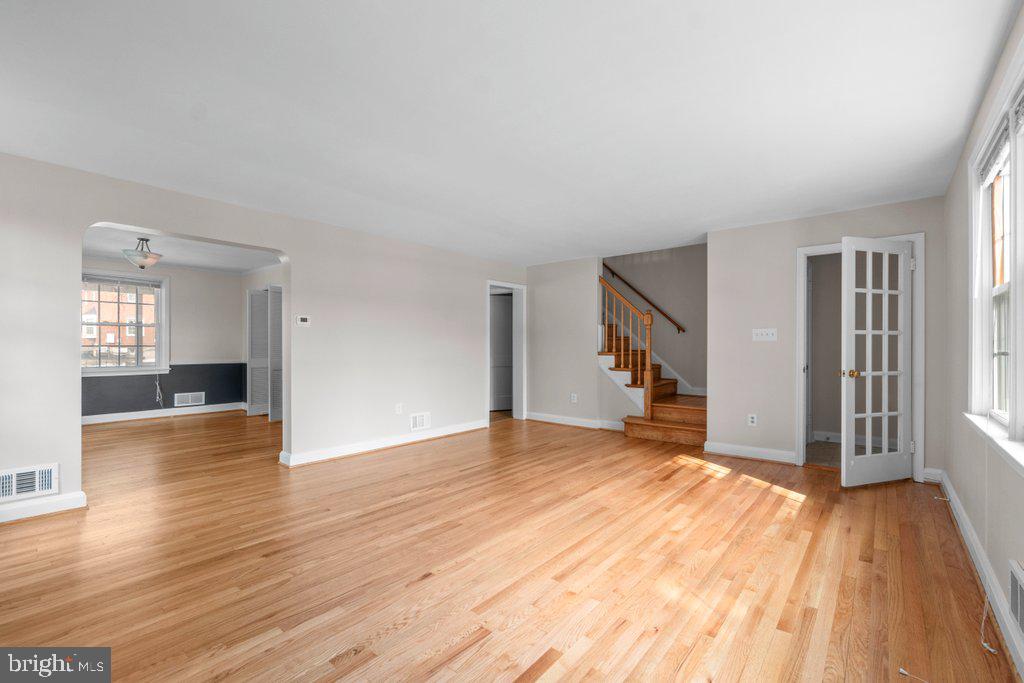 1522 Doxbury Road Baltimore, MD 21286 - Photo 3 of 28 wooden floor in an empty room with a window