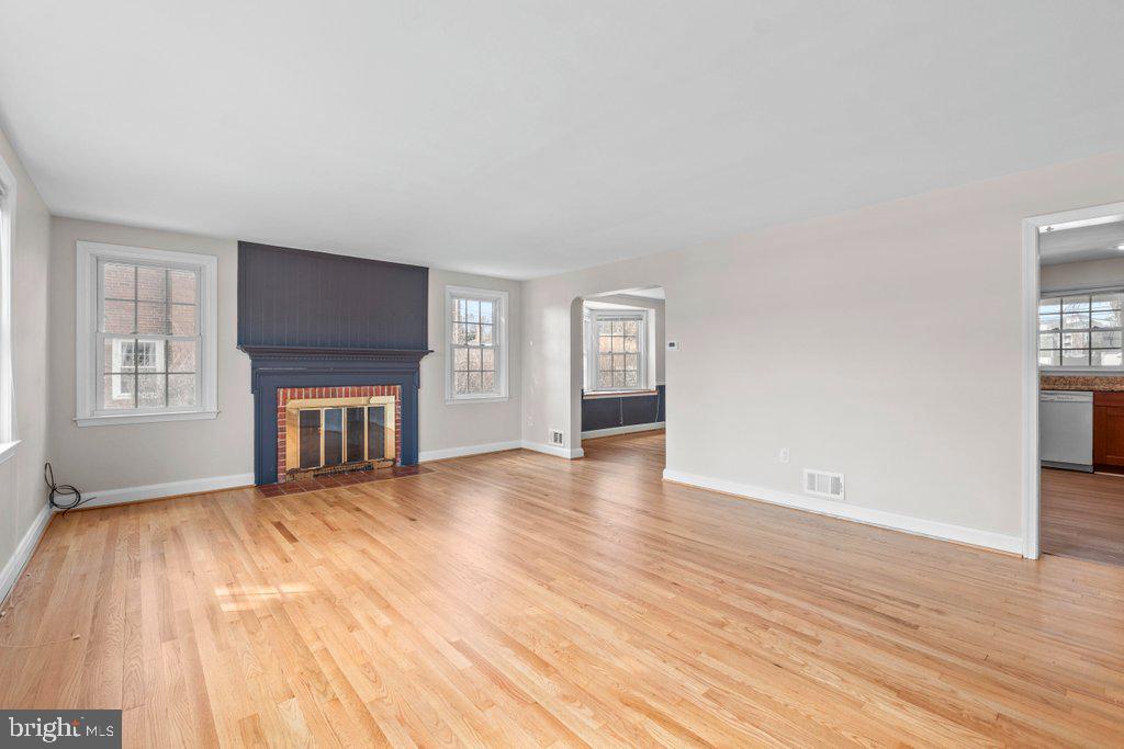 1522 Doxbury Road Baltimore, MD 21286 - Photo 5 of 28 a view of empty room with wooden floor and fan