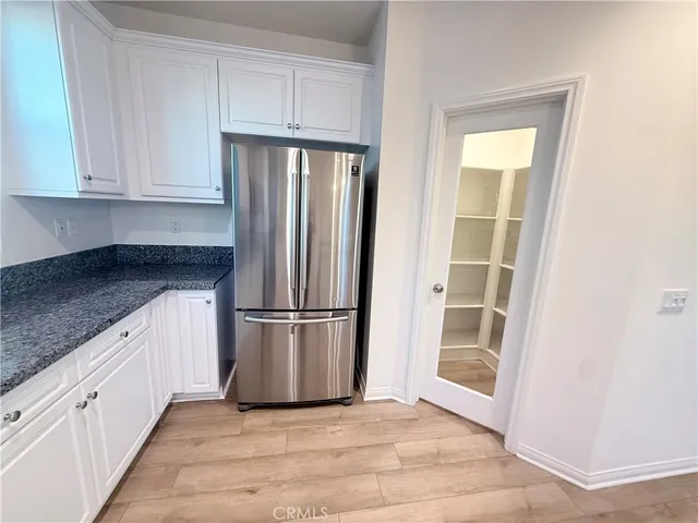 a bathroom with a double vanity sink mirror double and shower