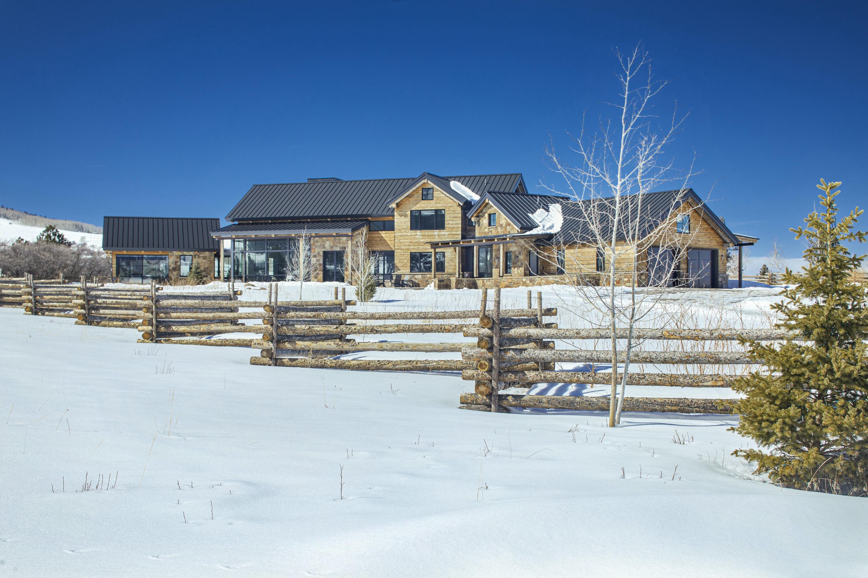 1050 / 973 Posey Road Placerville, CO 81430 - Photo 14 of 18 a front view of a house with a yard