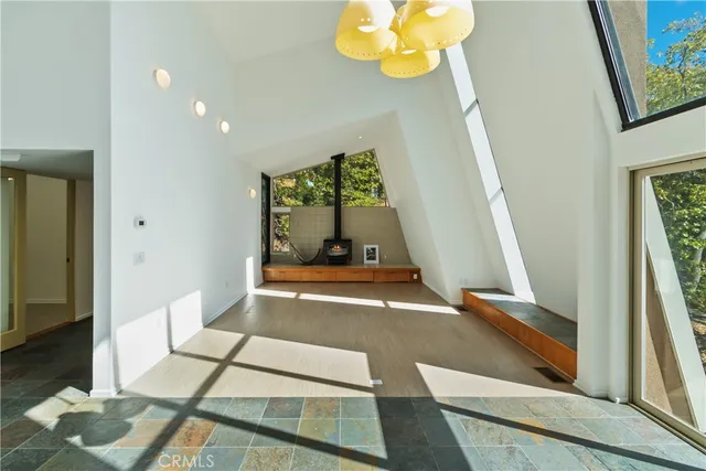a view of a bathroom with sink and mirror