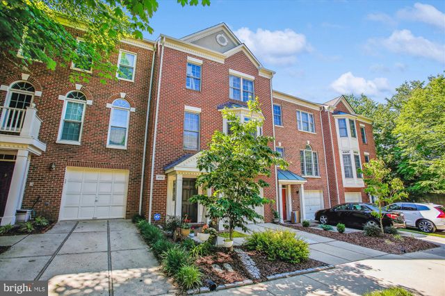 a front view of a multi story residential apartment buildings