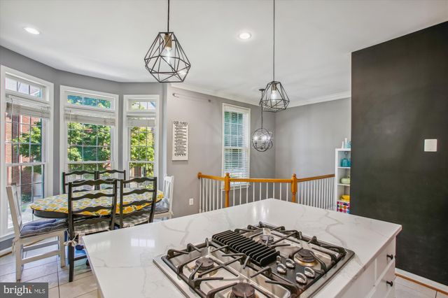 a bed room with furniture and a chandelier