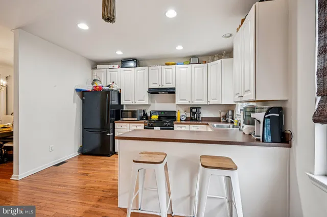 a bedroom with furniture and windows