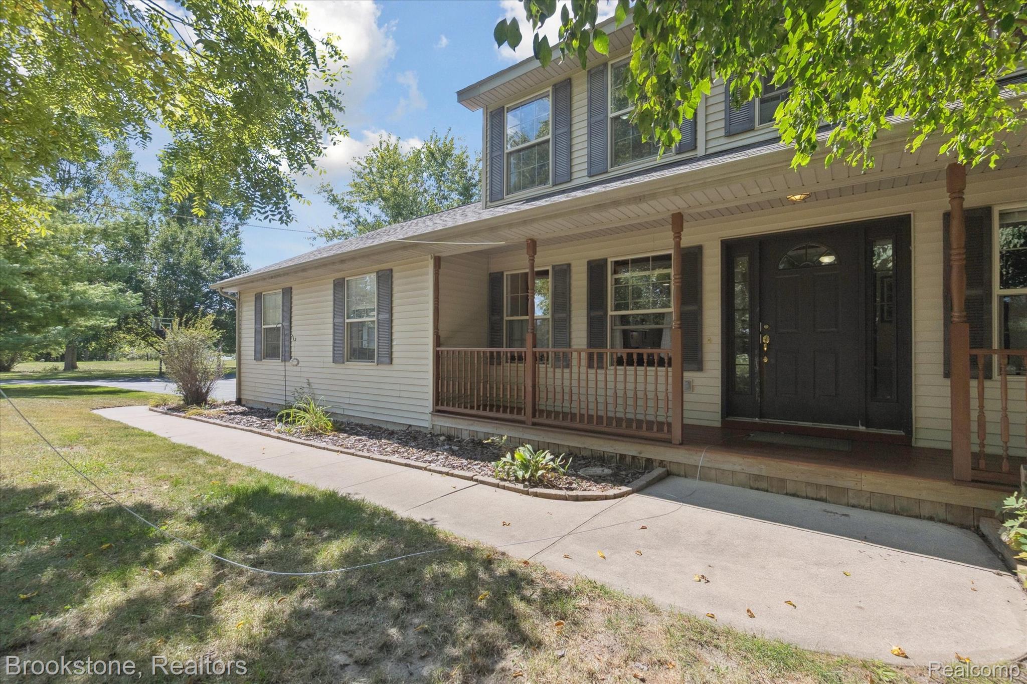 13962 South Beardslee Road Perry, MI 48872 - Photo 6 of 56 Entrance to property featuring a porch