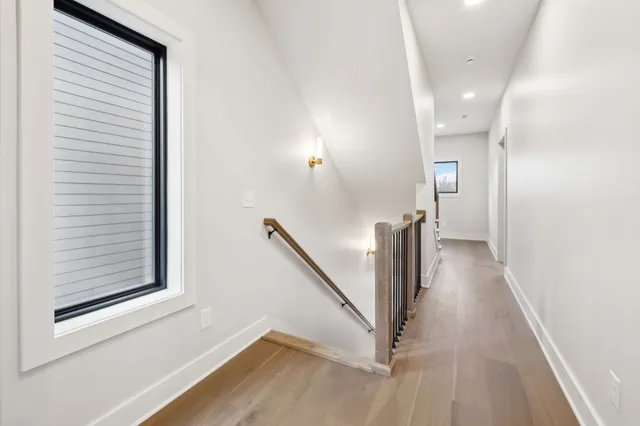 a view of a hallway with staircase