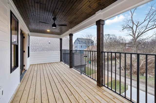 a view of porch with wooden floor