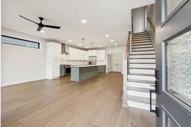 a view of a kitchen with a sink and a window