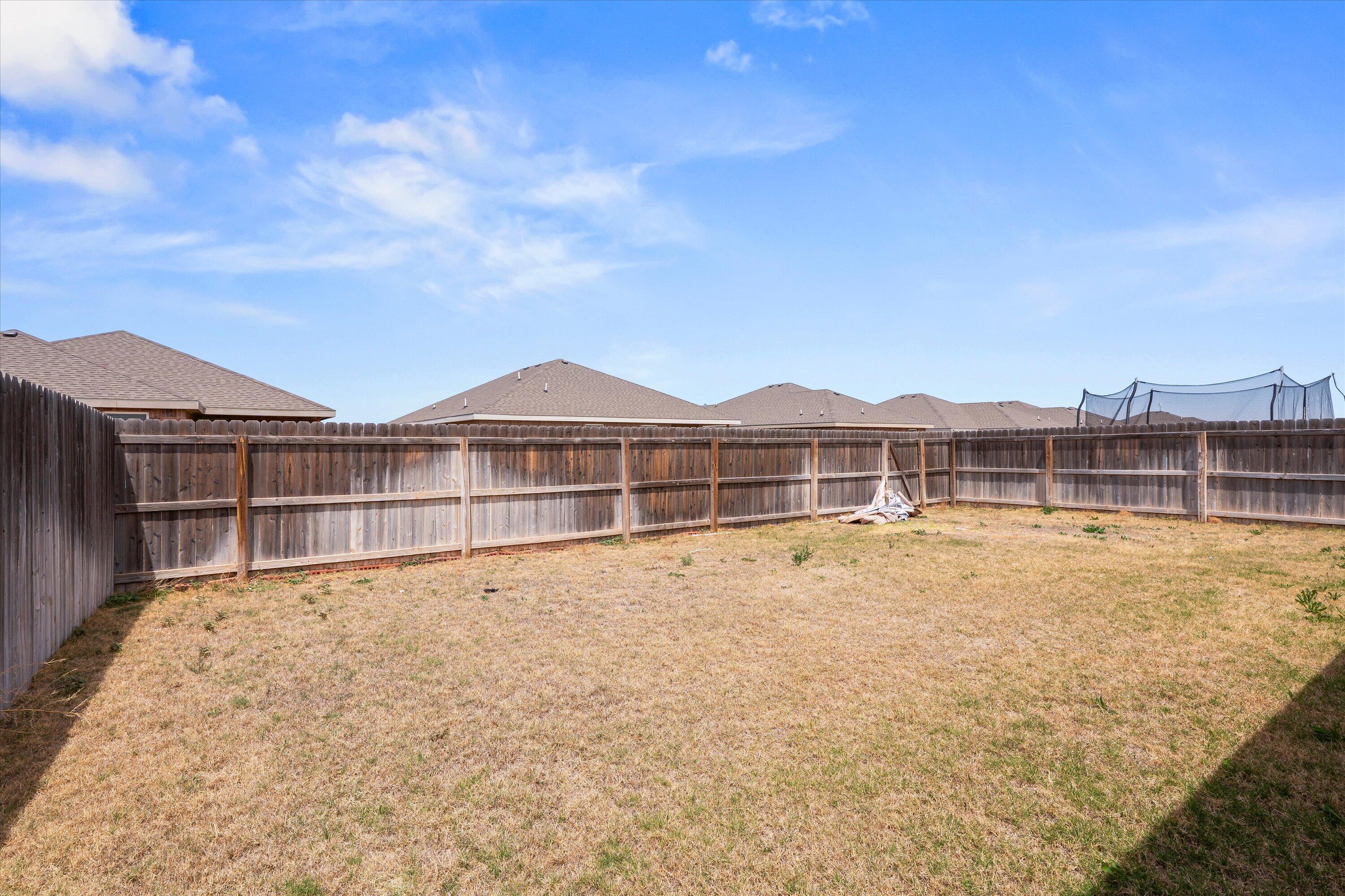 8414 11th Street Lubbock, TX 79416 - Photo 26 of 26 a view of front of house with swimming pool